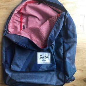 Herschel Supply Co. brand large backpack. Shades of blue.